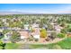 Scenic aerial view of the community nestled among lush greenery and a golf course at 5216 Desert Star Dr, Las Vegas, NV 89130