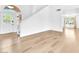 Foyer featuring hardwood floors, a white wall, and a view of the staircase at 5216 Desert Star Dr, Las Vegas, NV 89130