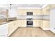 Updated kitchen with granite countertops, subway tile backsplash and stainless oven at 5216 Desert Star Dr, Las Vegas, NV 89130