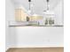 Bright kitchen with light wood cabinets and breakfast bar at 5216 Desert Star Dr, Las Vegas, NV 89130