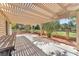 Spacious covered patio with view of the greenway offers ample space for outdoor enjoyment at 5216 Desert Star Dr, Las Vegas, NV 89130