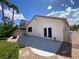 Backyard featuring a patio area with lush landscaping with nice shrubbery and some mature trees at 5376 S Conquistador St, Las Vegas, NV 89148