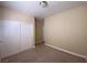 Neutral bedroom with ample storage offered by a double closet and good natural light at 5376 S Conquistador St, Las Vegas, NV 89148