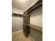 Spacious walk-in closet with custom shelving, rods, and pull-out wire baskets at 5376 S Conquistador St, Las Vegas, NV 89148