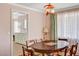 A cozy dining area is adjacent to the kitchen, perfect for meals and entertaining at 557 6Th St, Boulder City, NV 89005
