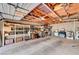 Organized garage interior featuring shelving, storage boxes, and a washer and dryer at 557 6Th St, Boulder City, NV 89005
