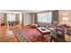 A traditional living room with hardwood floors, oriental rug, and classic furniture at 557 6Th St, Boulder City, NV 89005