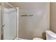 This bathroom features a glass-enclosed shower with white tiling and modern fixtures at 5655 E Sahara Ave # 1052, Las Vegas, NV 89142