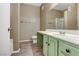 Bathroom featuring laminate flooring, laminate countertops, and walk-in shower at 5655 E Sahara Ave # 1052, Las Vegas, NV 89142
