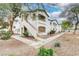 Charming condo complex featuring well-maintained landscaping and inviting curb appeal at 5655 E Sahara Ave # 1052, Las Vegas, NV 89142