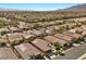 This aerial view captures a vibrant community featuring well-maintained homes and desert landscaping at 5745 Sagamore Canyon St, North Las Vegas, NV 89081