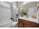 Classic bathroom with tub-shower combo and elegant decorations at 5745 Sagamore Canyon St, North Las Vegas, NV 89081