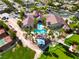 Aerial view showcasing the community clubhouse, swimming pool, and well manicured landscaping at 5745 Sagamore Canyon St, North Las Vegas, NV 89081