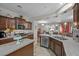 Modern kitchen featuring granite countertops, stainless steel appliances, and an open layout at 5745 Sagamore Canyon St, North Las Vegas, NV 89081