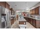 Modern kitchen featuring granite countertops, stainless steel appliances, and an open layout at 5745 Sagamore Canyon St, North Las Vegas, NV 89081