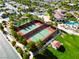 Aerial view of the community's well-maintained tennis courts near the clubhouse at 5745 Sagamore Canyon St, North Las Vegas, NV 89081
