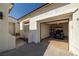 Two-car garage with an automatic door and a golf cart parked inside, offering convenience and storage at 5747 Jaborandi Ave, Pahrump, NV 89061