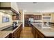 Well-appointed kitchen featuring an island, stainless steel appliances, and granite countertops at 5747 Jaborandi Ave, Pahrump, NV 89061
