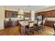 Spacious kitchen with island seating, stainless steel appliances, and custom cabinetry at 5747 Jaborandi Ave, Pahrump, NV 89061
