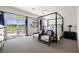 The main bedroom offers golf course views, an ensuite bathroom, and a relaxing sitting area at 5747 Jaborandi Ave, Pahrump, NV 89061