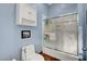 Clean bathroom featuring a shower/tub combination with glass doors at 6230 Calm Brook Ct, Las Vegas, NV 89149
