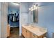 Bright bathroom with vanity, closet, and ample storage at 6230 Calm Brook Ct, Las Vegas, NV 89149