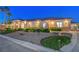 Stunning single-story stucco home with stone accents and well-maintained desert landscaping at 6230 Calm Brook Ct, Las Vegas, NV 89149