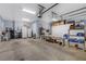 Spacious garage with ample storage cabinets and plenty of room for vehicles and hobbies at 6230 Calm Brook Ct, Las Vegas, NV 89149