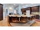 Large kitchen with a granite center island with seating and ample counter space at 6230 Calm Brook Ct, Las Vegas, NV 89149