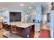 Spacious kitchen featuring a large island with granite countertops and seating at 6230 Calm Brook Ct, Las Vegas, NV 89149