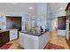 Stylish kitchen with a center island, granite countertops, and modern appliances at 6230 Calm Brook Ct, Las Vegas, NV 89149