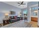 Cozy living room or den area with comfortable seating and natural light at 6230 Calm Brook Ct, Las Vegas, NV 89149