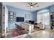 Comfortable home office with a large desk, natural light, and ample workspace at 6230 Calm Brook Ct, Las Vegas, NV 89149