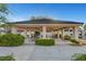 Covered picnic area with tables and fans in a well-maintained common area at 6230 Calm Brook Ct, Las Vegas, NV 89149