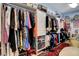 Walk-in closet with ample storage, shelving and hanging space for clothes and shoes at 6230 Calm Brook Ct, Las Vegas, NV 89149