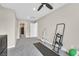 Spare bedroom with neutral walls, ceiling fan, and space for a small home gym at 625 Honesty Ct, Henderson, NV 89011