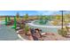 Community park featuring innovative play structures for and scenic landscaping for Gathering enjoyment at 625 Honesty Ct, Henderson, NV 89011