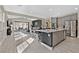 Open-concept kitchen flowing into the dining and living areas, perfect for entertaining at 625 Honesty Ct, Henderson, NV 89011