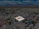 Overhead shot of a single-Gathering home with desert landscaping surrounded by a quiet suburban neighborhood at 654 Mazelle Ln, Pahrump, NV 89060