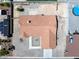 Aerial view of a single-Gathering home with desert landscaping, backyard and minimal surroundings at 654 Mazelle Ln, Pahrump, NV 89060