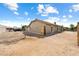 Spacious backyard with potential for landscaping, perfect for outdoor activities and creating a serene oasis at 654 Mazelle Ln, Pahrump, NV 89060
