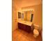 Well-lit bathroom with a vanity, a toilet, and a combination tub and shower at 7255 W La Madre Way, Las Vegas, NV 89149