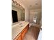 Bathroom featuring a vanity with ample countertop space, a sink, and a combination tub and shower at 7255 W La Madre Way, Las Vegas, NV 89149