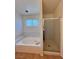 Luxurious bathroom featuring a soaking tub and a separate glass-enclosed shower at 7255 W La Madre Way, Las Vegas, NV 89149