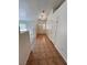 Welcoming entryway featuring neutral tones, tile flooring and a modern light fixture at 7255 W La Madre Way, Las Vegas, NV 89149