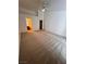 A large primary bedroom with neutral carpet, walk-in closet, en-suite bathroom, and vaulted ceiling at 7255 W La Madre Way, Las Vegas, NV 89149