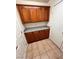 This pantry features wooden cabinets above and below a lovely countertop at 7255 W La Madre Way, Las Vegas, NV 89149