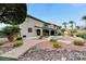 Beautiful backyard featuring a swimming pool, patio area, mature landscaping and stone pathway at 733 Secret London Ave, Las Vegas, NV 89178