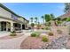 Large backyard boasting an in-ground pool, spa, desert landscaping and mature plants at 733 Secret London Ave, Las Vegas, NV 89178