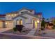 Charming home featuring manicured landscaping, stone accents, and a welcoming front entrance at 733 Secret London Ave, Las Vegas, NV 89178